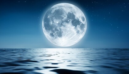 full moon raising over water