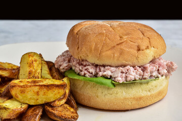 spam salad sandwich with potato wedges