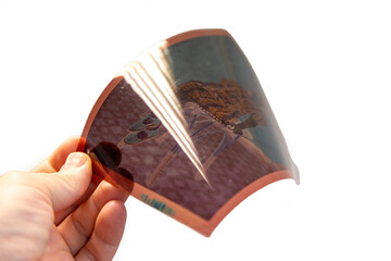 Negative color photographic film with a color image for printing a color photo.
