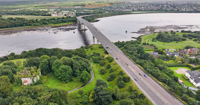 Aerial view of the Foyle Bridge over the river Foyle and Derry Londonderry Northern Ireland