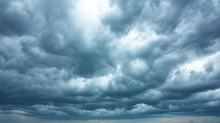 Obraz premium Brooding Storm Clouds Above, Setting a Moody Scene for Impending Weather Drama