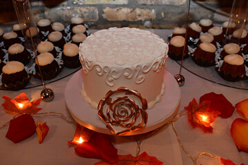 wedding cake and cupcakes 