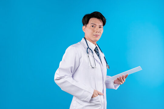 Profile smart doctor holding transparent tablet looking camera with disease research data futuristic technology attempting remedy therapy healthcare innovation interface hologram screen. Contrivance.