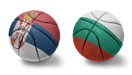 basketball balls with the national flags of bulgaria and serbia on the white background.