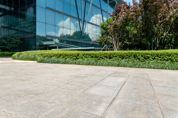 empty concrete ground in front of modern office buildings in downtown. floor for copy space
