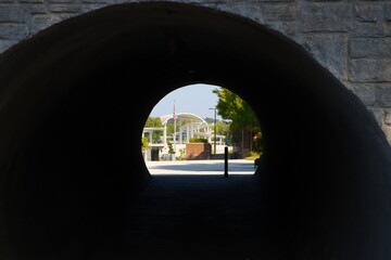 View of Town Center on Main + DeLay Nature Park through a tunnel