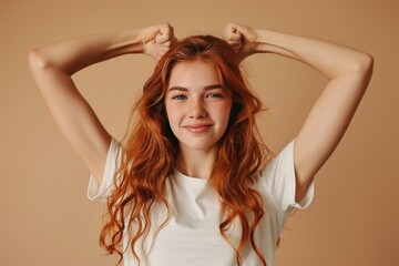 Fototapeta premium A woman with striking red hair poses for the camera, attention-grabbing and confident