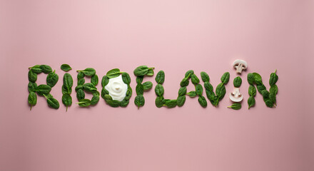 Spinach food art forming riboflavin text with creamy element and mushroom