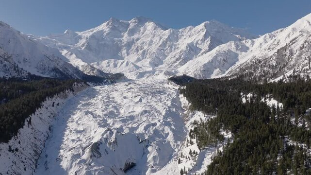Snowy Nanga Parbat at Winter. Aerial Drone Shot with a glacier in valley, Fairy Meadows Pakistan, Mount Killer at Dawn