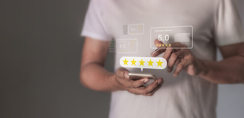 Customer Review, Young Man hand using smartphone mobile touch five star to review and give 5 stars with very good results in service, Good review 5 star rating choice feedback