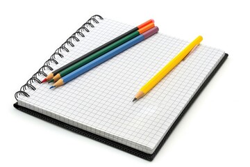 A notebook with two colored pencils on top
