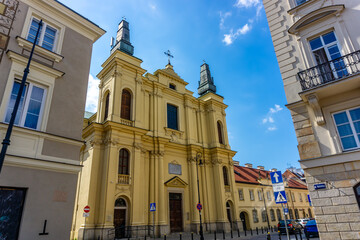 Fototapeta premium Roman Catholic Church of St Francis iin the center of Old town Warsaw, July 20, 2024..