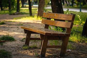 Naklejka premium Antique wooden bench in the park