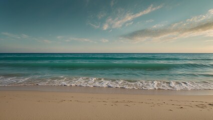 Fototapeta premium Beautiful serene beach with waves gently crashing on the sandy shore.