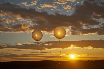 Dawn's Early Light: Sunburst Weather Balloons Ascending for Research