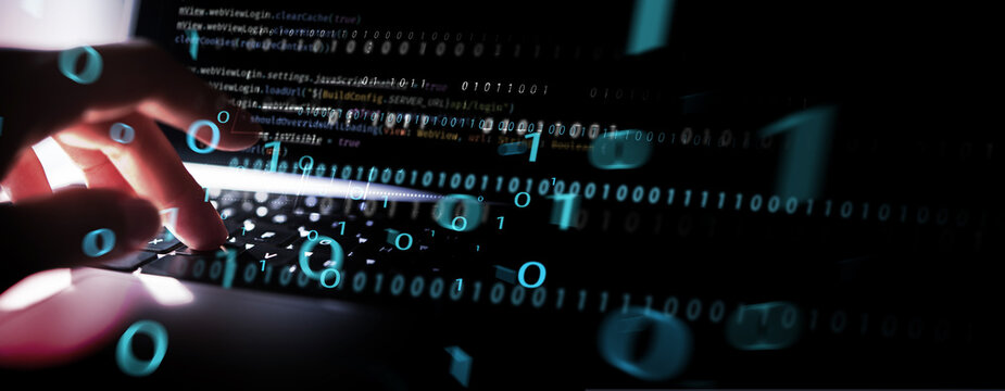 Digital technology, software development concept. Coding programmer, software engineer working on laptop with javascript  and binary code on virtual screen, technology background