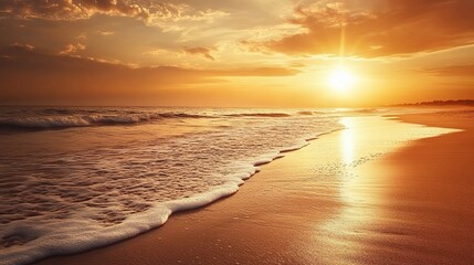 Fototapeta premium Sunset casting a golden glow over a sandy beach