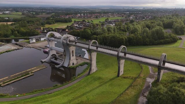 Aerial view of the Falkirk Wheel. A rotating boat lift that connects the Forth and Clyde Canals in Scotland. Also a popular tourist attraction.