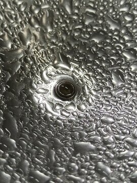 Close Up. Water Dew on stainless.