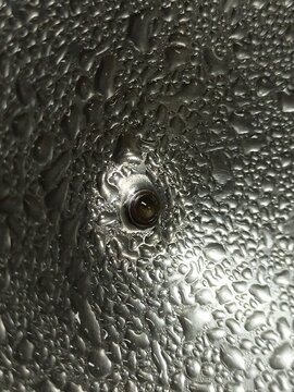 Close Up. Water Dew on stainless.