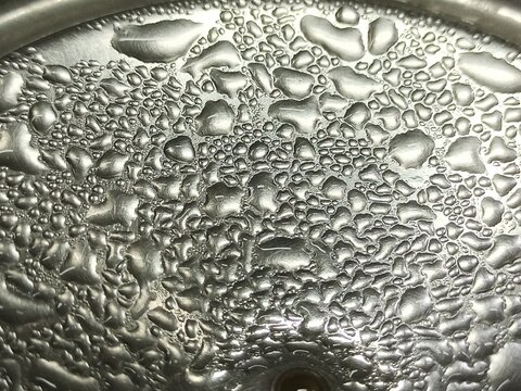 Close Up. Water Dew on stainless.