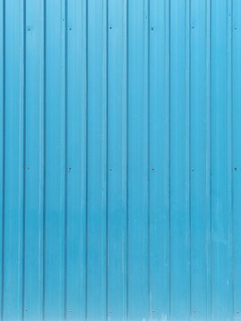 Sky blue walls. Symmetrical line background.