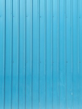 Sky blue walls. Symmetrical line background.