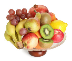 Glass vase with different fresh fruits isolated on white
