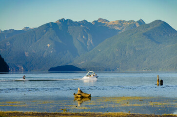 Wakeboarding On The Lake With Majestic Mountain Views