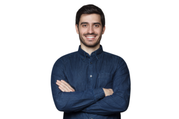 Confident young man standing with crossed arms