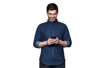 Portrait of young smiling business man typing a message with new app on his mobile phone