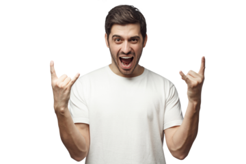 Young man showing rock gesture with his fingers as if listening to favourite music