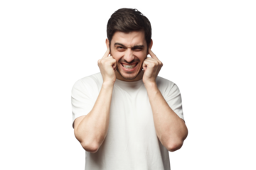 Young man closing his ears not willing to hear loud noise from neighbours