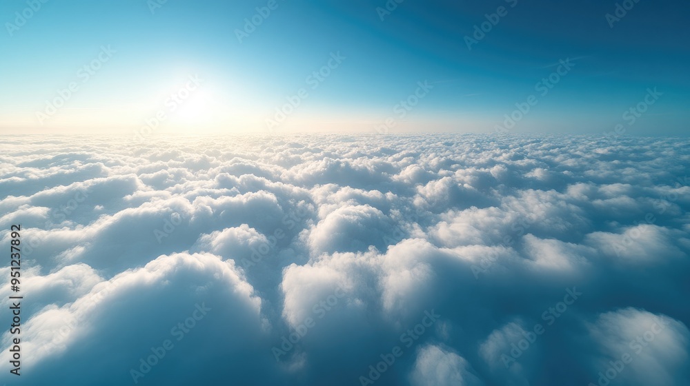 Poster a panoramic view from above the clouds, with the horizon line blending seamlessly into the soft clou