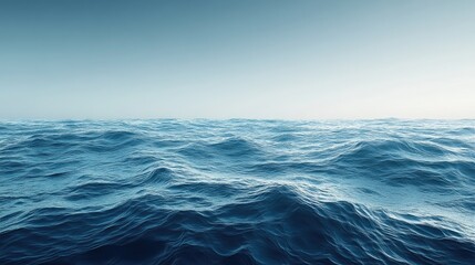 A panoramic view of a vast ocean with a gradient of blue tones and gentle waves, perfect for summer themed designs with ample copy space.
