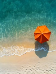 Naklejka premium Aerial View of Vibrant Orange Umbrella on Pristine Beach with Turquoise Waters