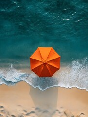 Naklejka premium Overhead Aerial View of Orange Umbrella on Beautiful Summer Beach