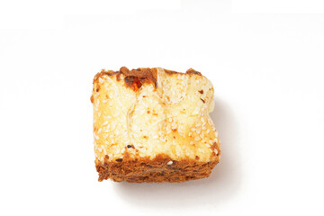 A soft and savory rolled bread topped with shredded beef or chicken floss (floss roll bread), photographed against a white background. Perfect as a snack.