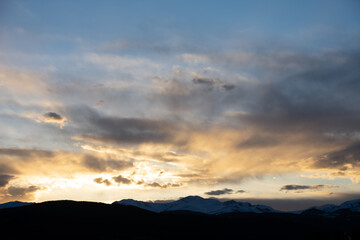 Sun setting Behind the Colorado Rocky Mountains