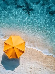 Fototapeta premium Serene Summer Beach with Vibrant Yellow Umbrella in Turquoise Waters