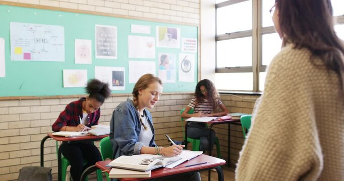 Teacher, school kids and applause in class, happy and announcement for results, achievement or goals. Professional woman, education and learning with children for development, laugh and comic joke