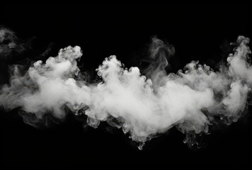 White Smoke Billowing Against a Black Background