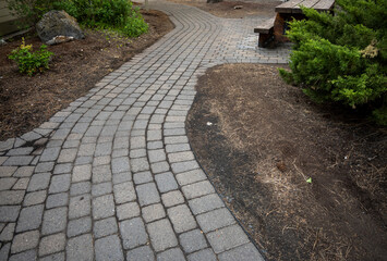 Cobbled foot path with picnic table, a relaxing environment, a state of leisure_06262021_2791.