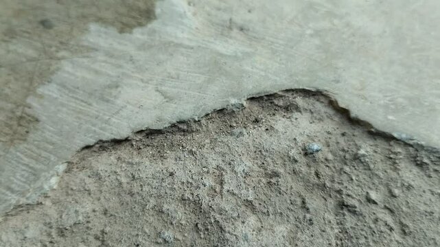Concrete surfaces are peeling or spalling. due to extreme weather