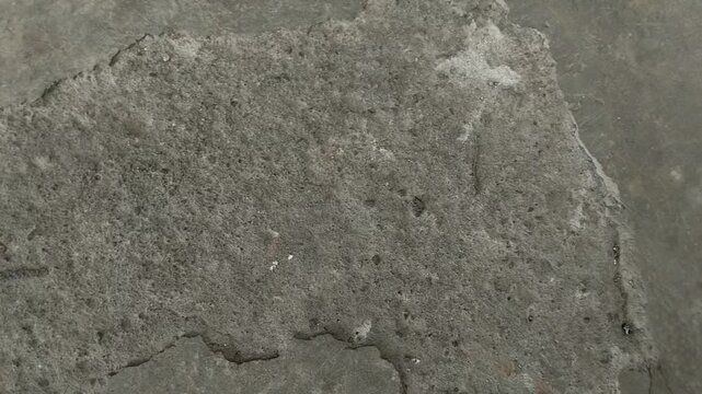Concrete surfaces are peeling or spalling. due to extreme weather