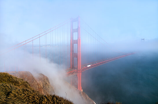 Golden Gate Bridge Shrouded in Mystical Fog Overlooking the Bay in San Francisco - California, United States