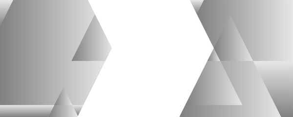 An abstract image with gray triangles and a white space.