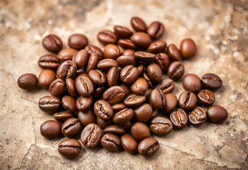 Roasted coffee beans on a textured background