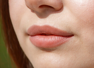 Close-up of lips on a girl's face. Macro