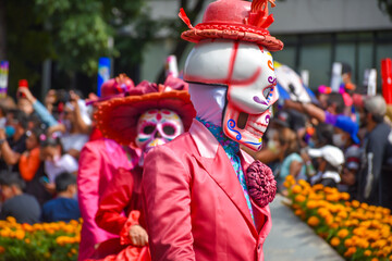 Day of the dead parade in Mexico city, Catrinas with colorful costumes in an exciting tradition